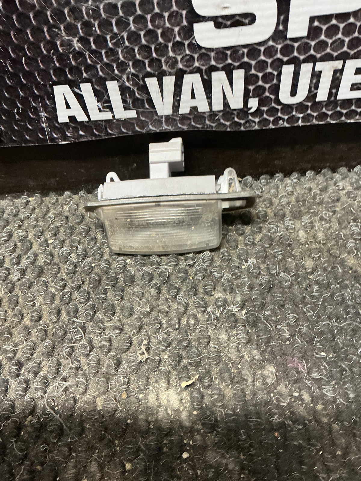 2006 Mitsubishi Outlander- Number Plate Lamp- (TAG11298)