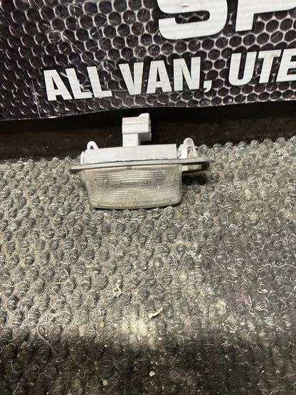 2006 Mitsubishi Outlander- Number Plate Lamp- (TAG11298)