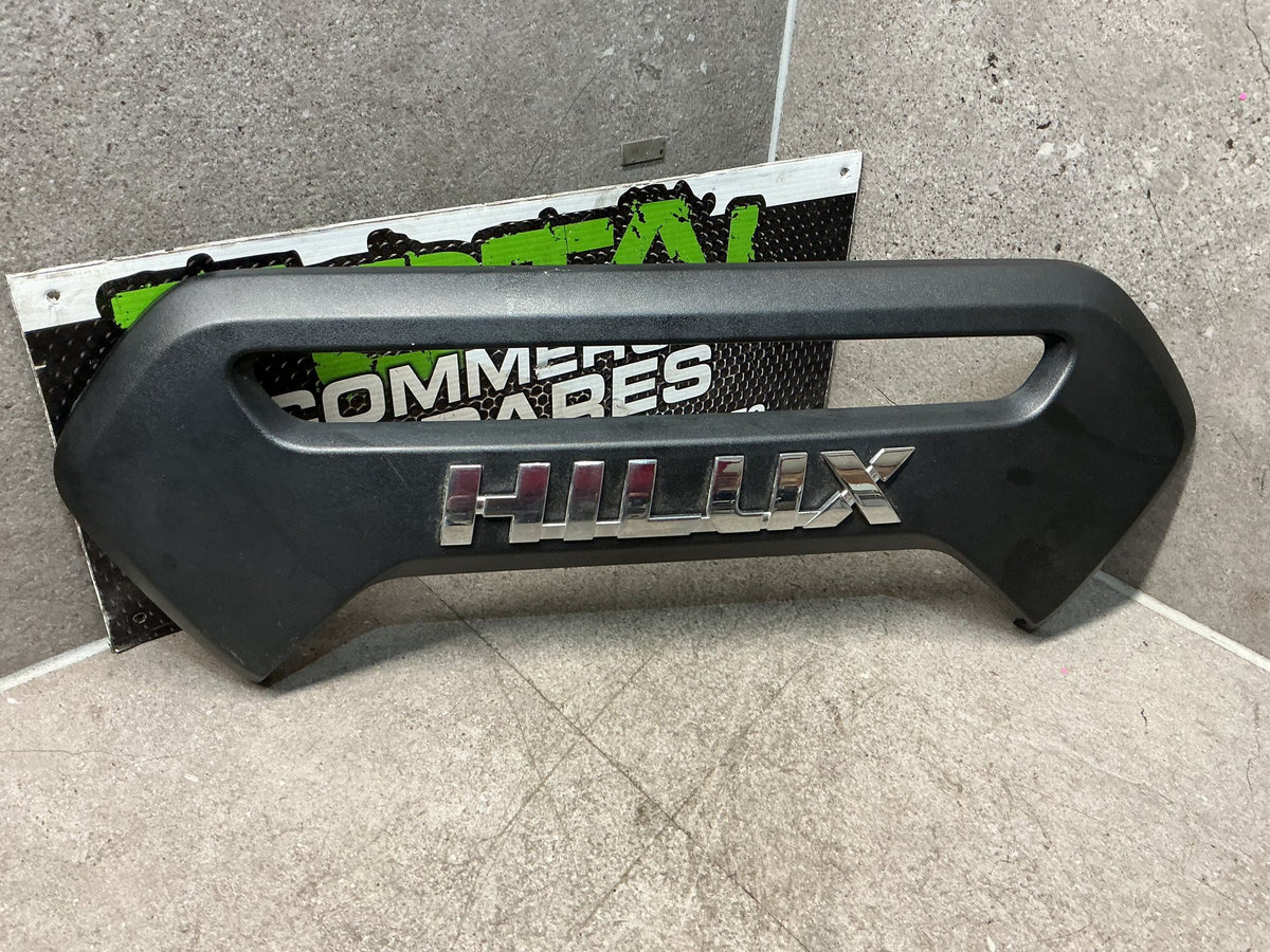2015-2024 Toyota Hilux GUN- Centre Tailgate Garnish- (TAG15113)