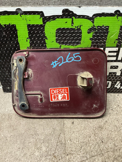 1993-1995 Toyota Hilux II N130- Fuel Filler Door- (TAG16047)