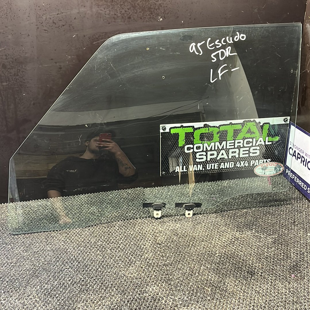 1995 Suzuki Escudo- Left Front Door Window- (TAG7843) PN: M213