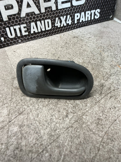 1999-2006 Ford Courier UN- Left Front Door Interior Handle- (TAG15605)