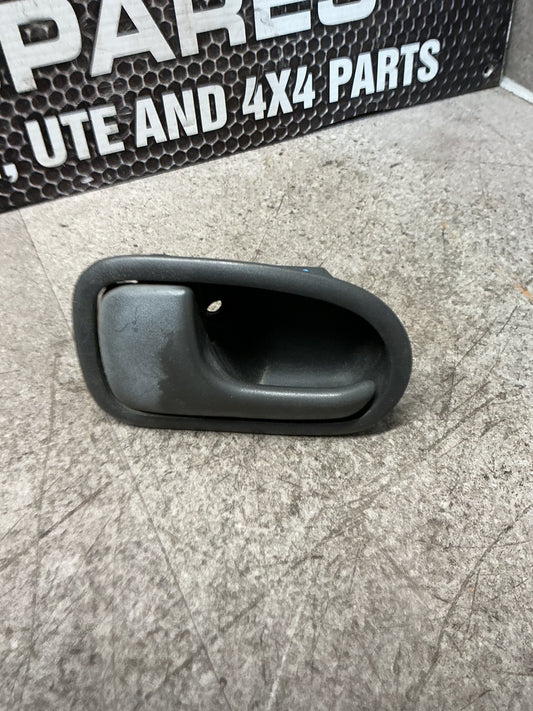 1999-2006 Ford Courier UN- Left Front Door Interior Handle- (TAG15605)