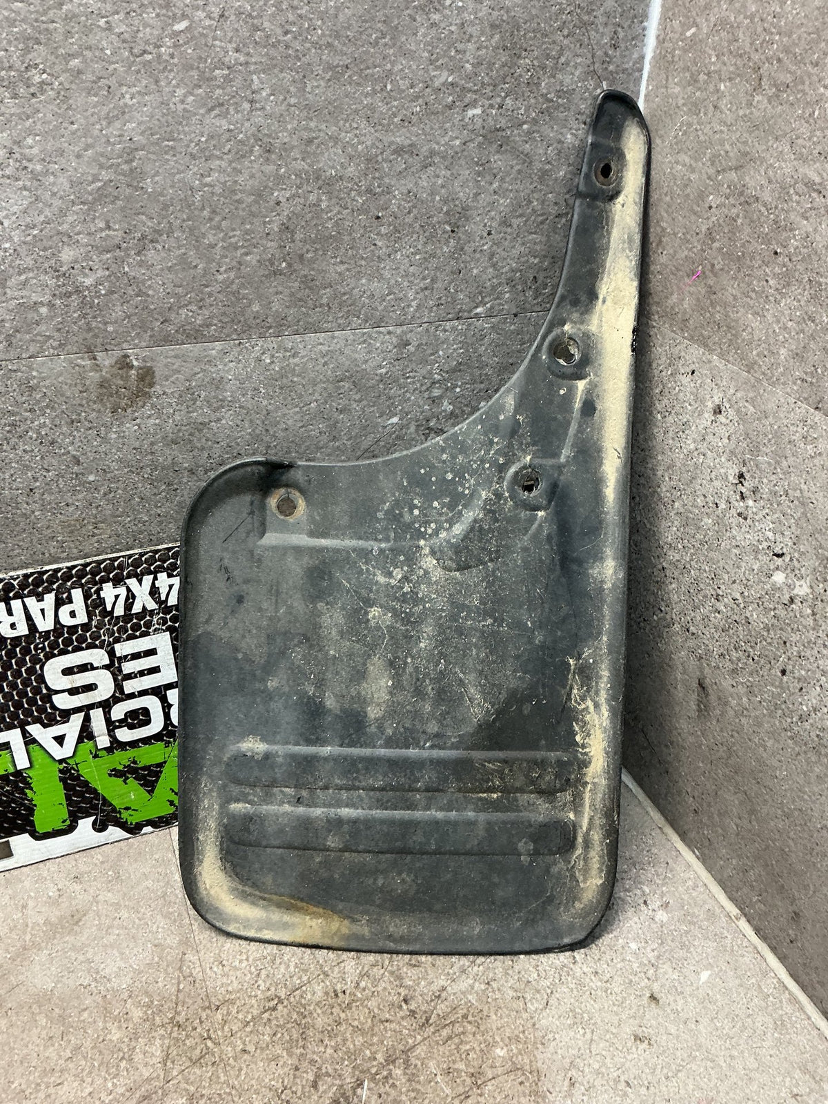 2009 Toyota Hilux VII N10- Left Rear Mudflap- (TAG16215) PN: 76626-0K030