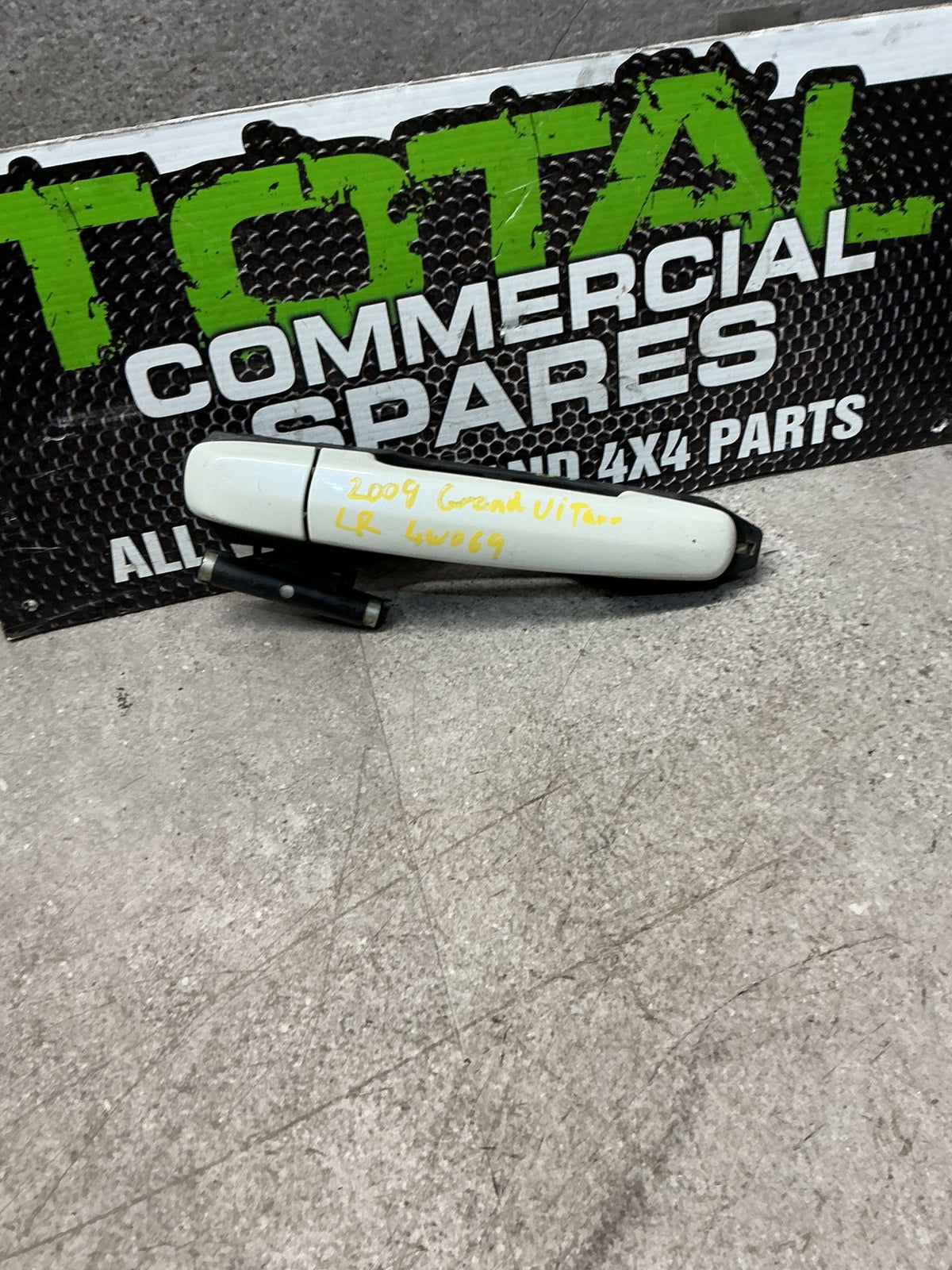 2009 Suzuki Grand Vitara 4W069- Left Rear Door Exterior Handle- (TAG14757)