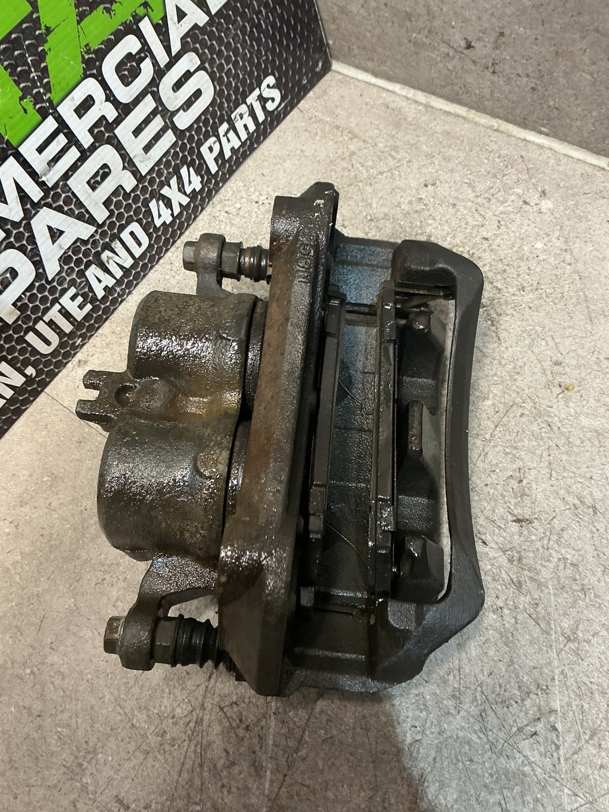 2006 Nissan Navara D40- Left Front Caliper- (TAG16878)