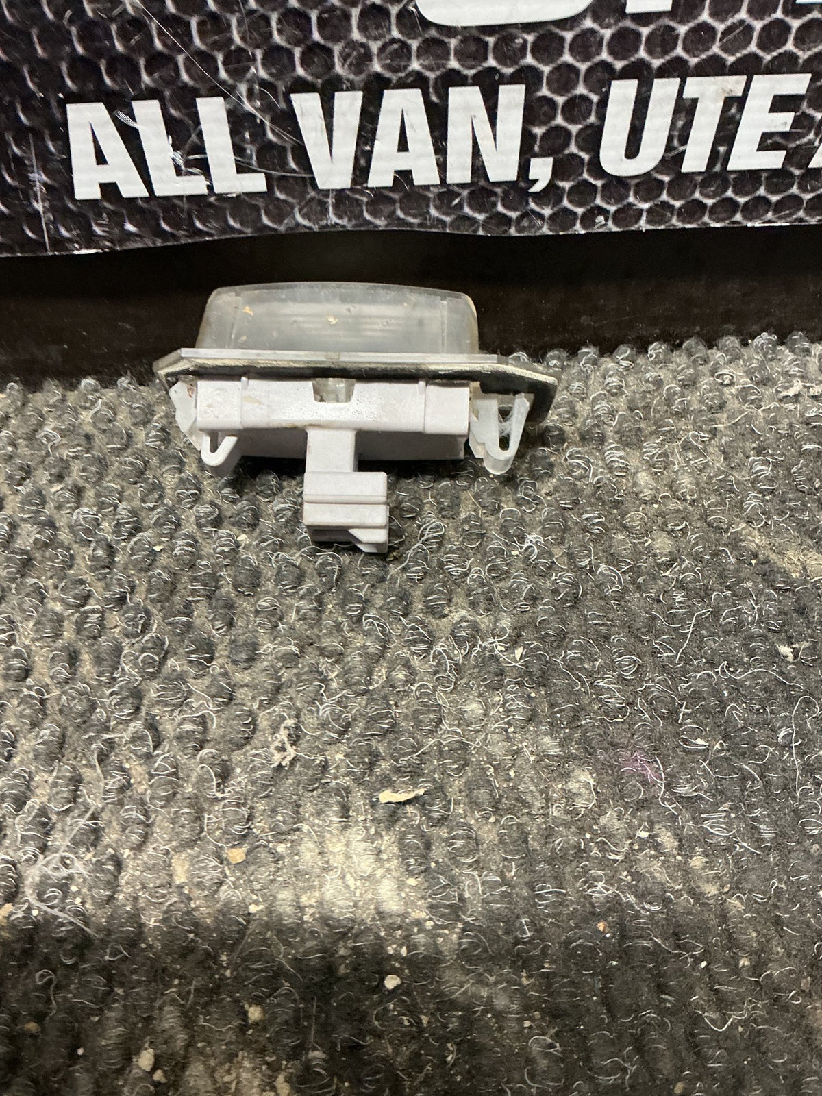 2006 Mitsubishi Outlander- Number Plate Lamp- (TAG11298)
