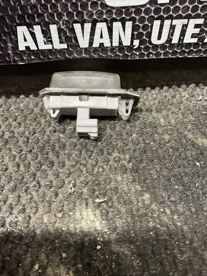2006 Mitsubishi Outlander- Number Plate Lamp- (TAG11298)